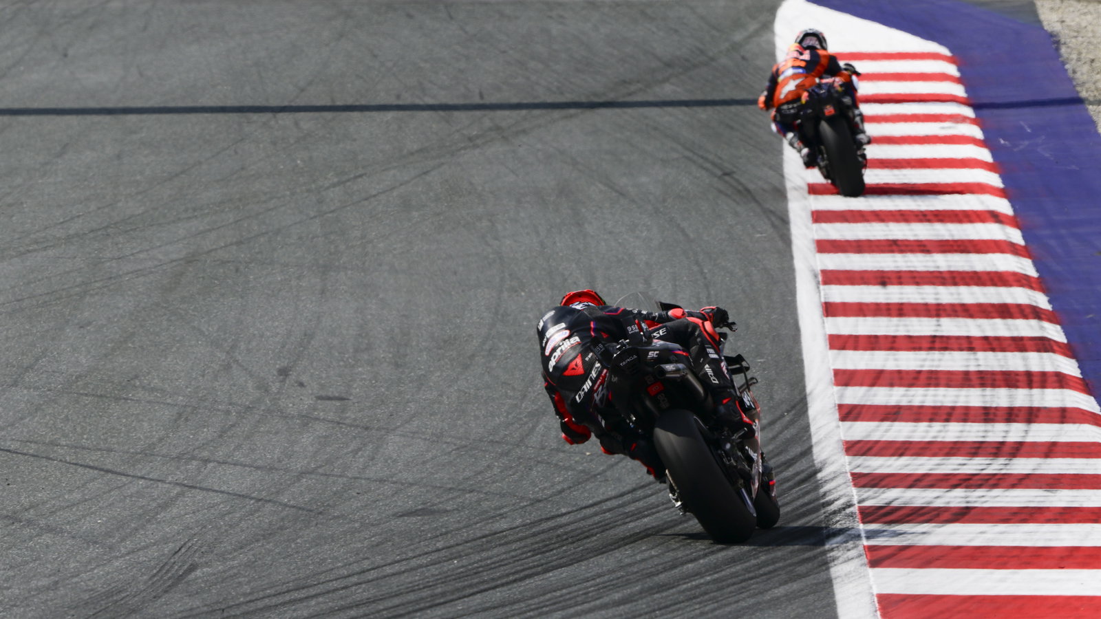Marco Bezzecchi chases Pedro Acosta, 2025 MotoGP Austrian Grand Prix. Credit: Gold and Goose.