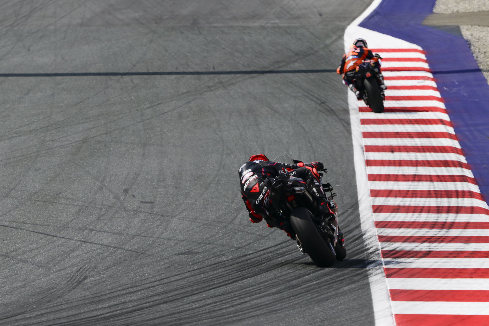 Marco Bezzecchi chases Pedro Acosta, 2025 MotoGP Austrian Grand Prix. Credit: Gold and Goose.