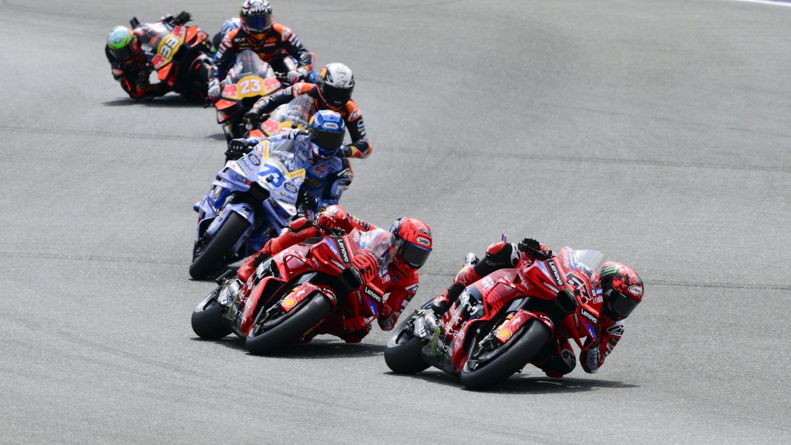 Francesco Bagnaia leads Marc Marquez, Alex Marquez, 2025 MotoGP Austrian Grand Prix. Credit: Gold and Goose.