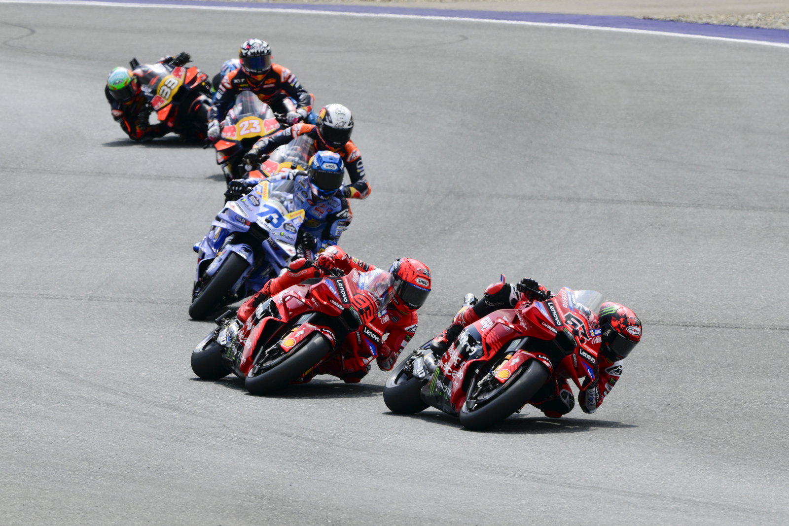 Francesco Bagnaia leads Marc Marquez, Alex Marquez, 2025 MotoGP Austrian Grand Prix. Credit: Gold and Goose.