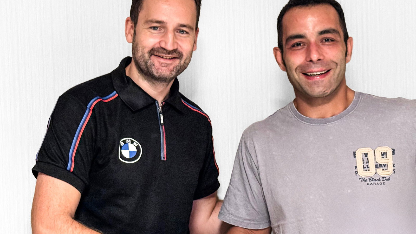 Sven Blusch shakes hands with Danilo Petrucci. Credit: BMW.