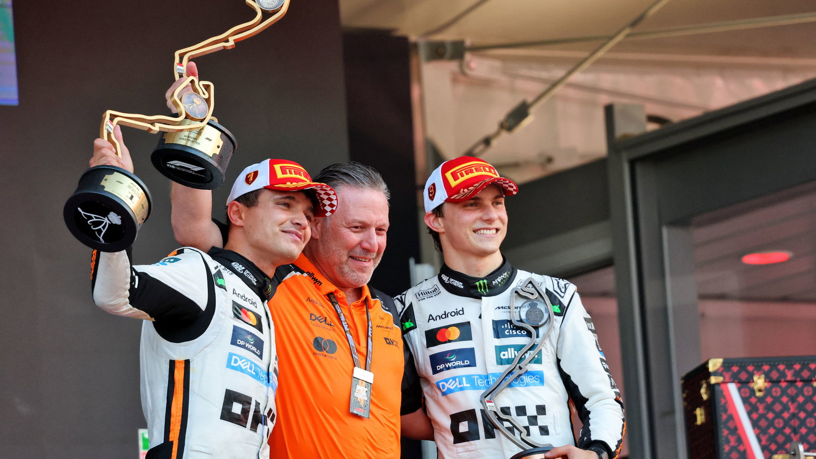Lando Norris, Zak Brown, Oscar Piastri
