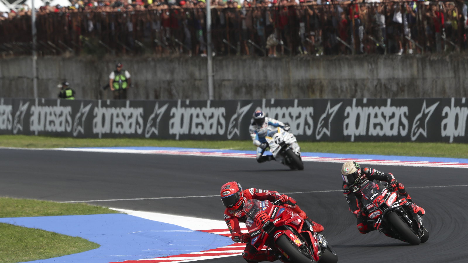 Marc Marquez leads Marco Bezzecchi, Alex Marquez, 2025 MotoGP San Marino Grand Prix. Credit: Gold and Goose.
