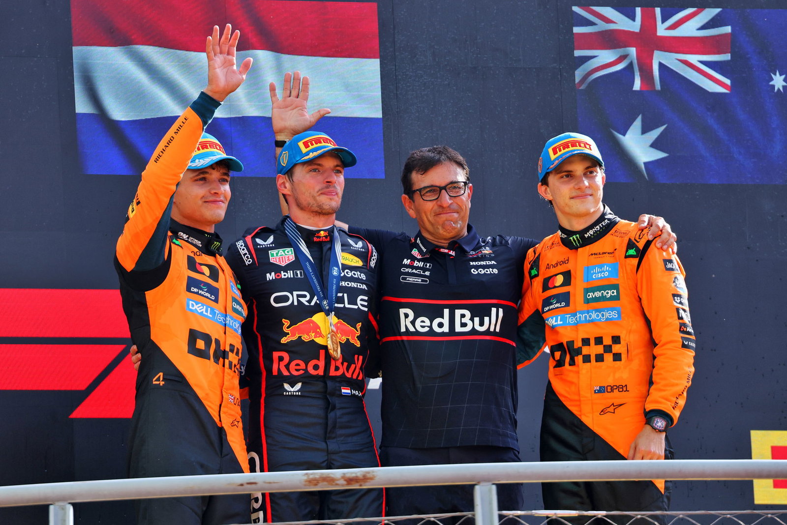 Max Verstappen and Pierre Wache on the podium at Monza