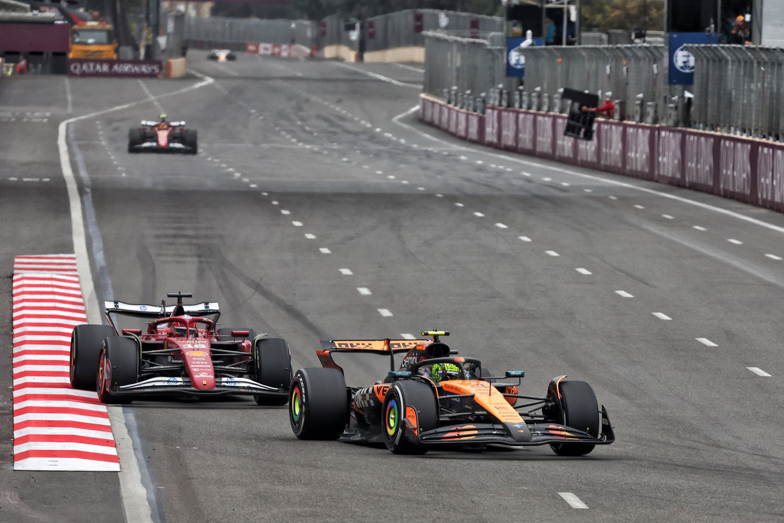 Lando Norris ahead of Charles Leclerc