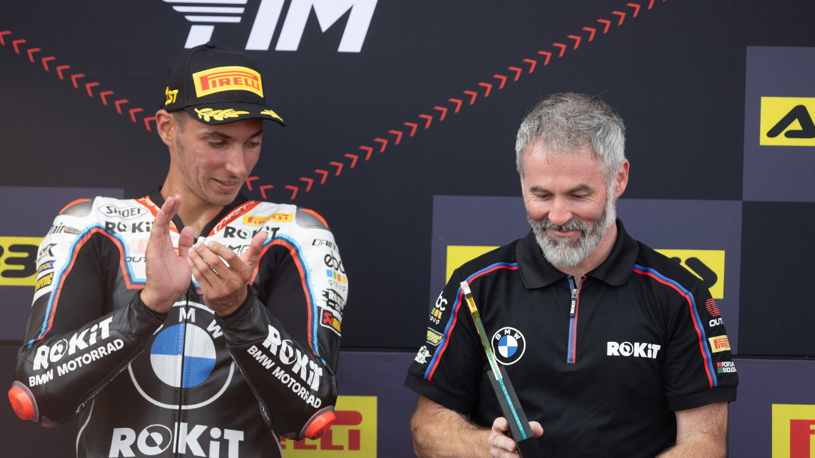 Toprak Razgatlioglu, Phil Marron, 2025 Hungarian WorldSBK, podium. Credit: Gold and Goose.