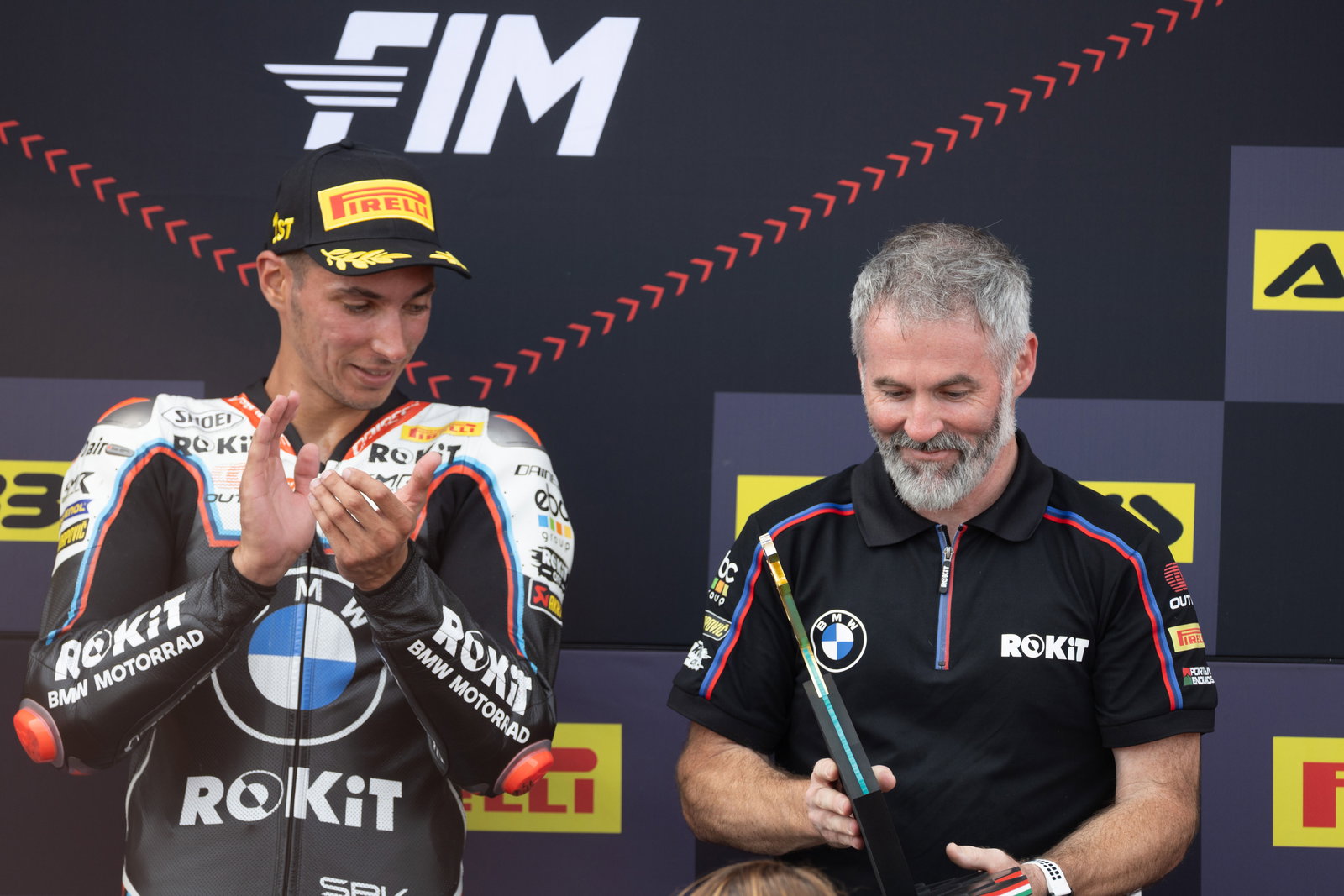 Toprak Razgatlioglu, Phil Marron, 2025 Hungarian WorldSBK, podium. Credit: Gold and Goose.