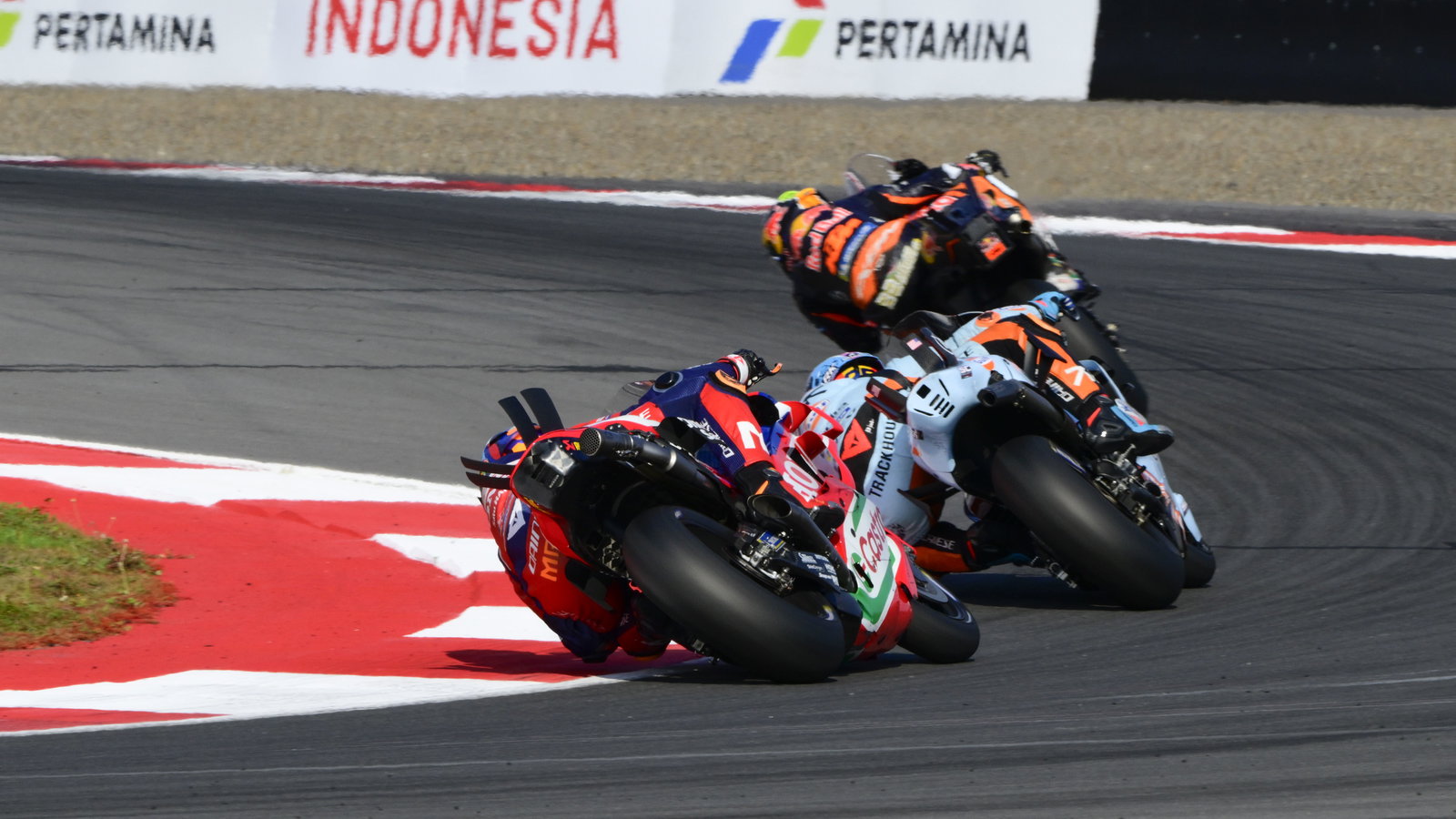 Luca Marini chases Raul Fernandez, Brad Binder, 2025 MotoGP Indonesian Grand Prix. Credit: Gold and Goose.