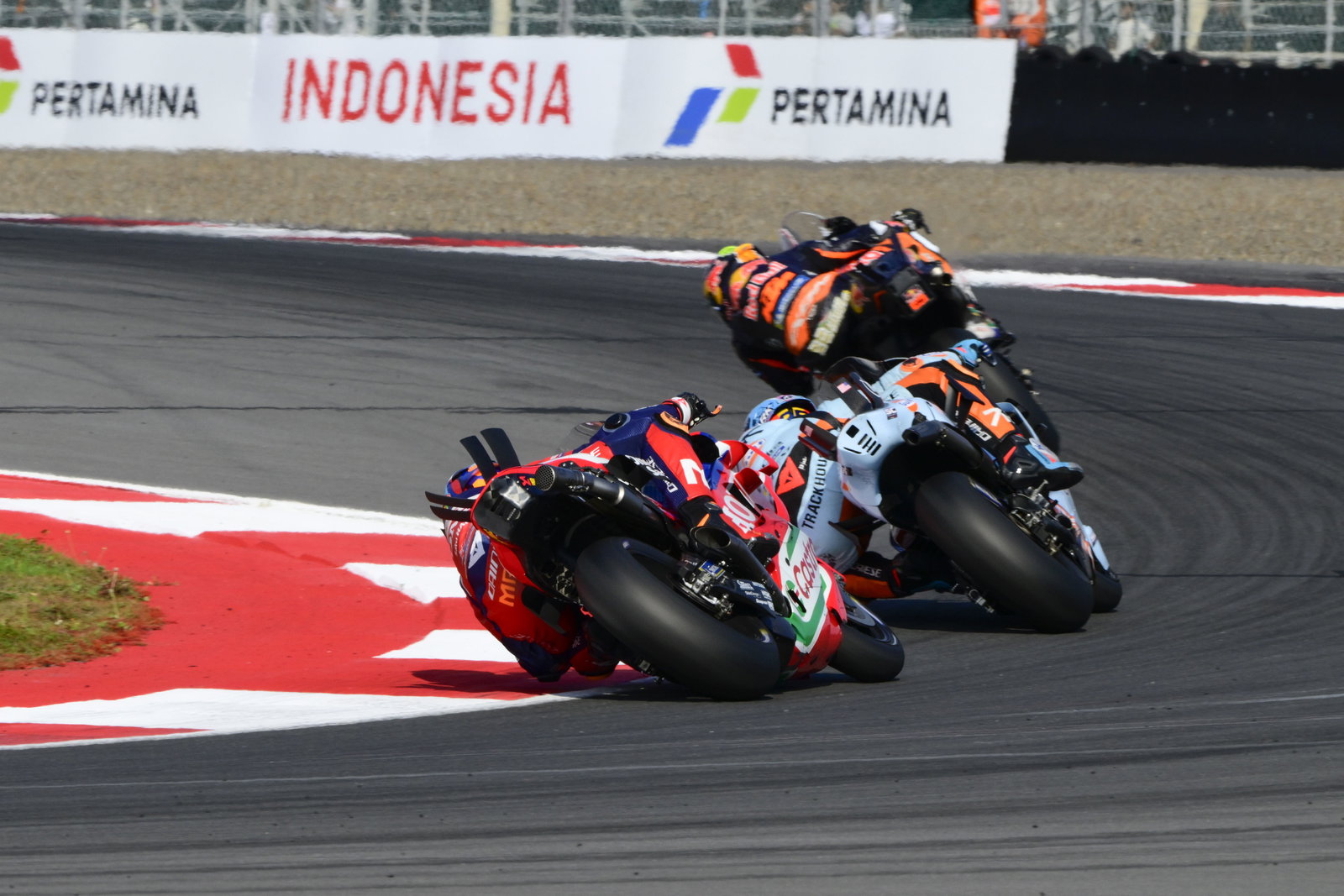 Luca Marini chases Raul Fernandez, Brad Binder, 2025 MotoGP Indonesian Grand Prix. Credit: Gold and Goose.