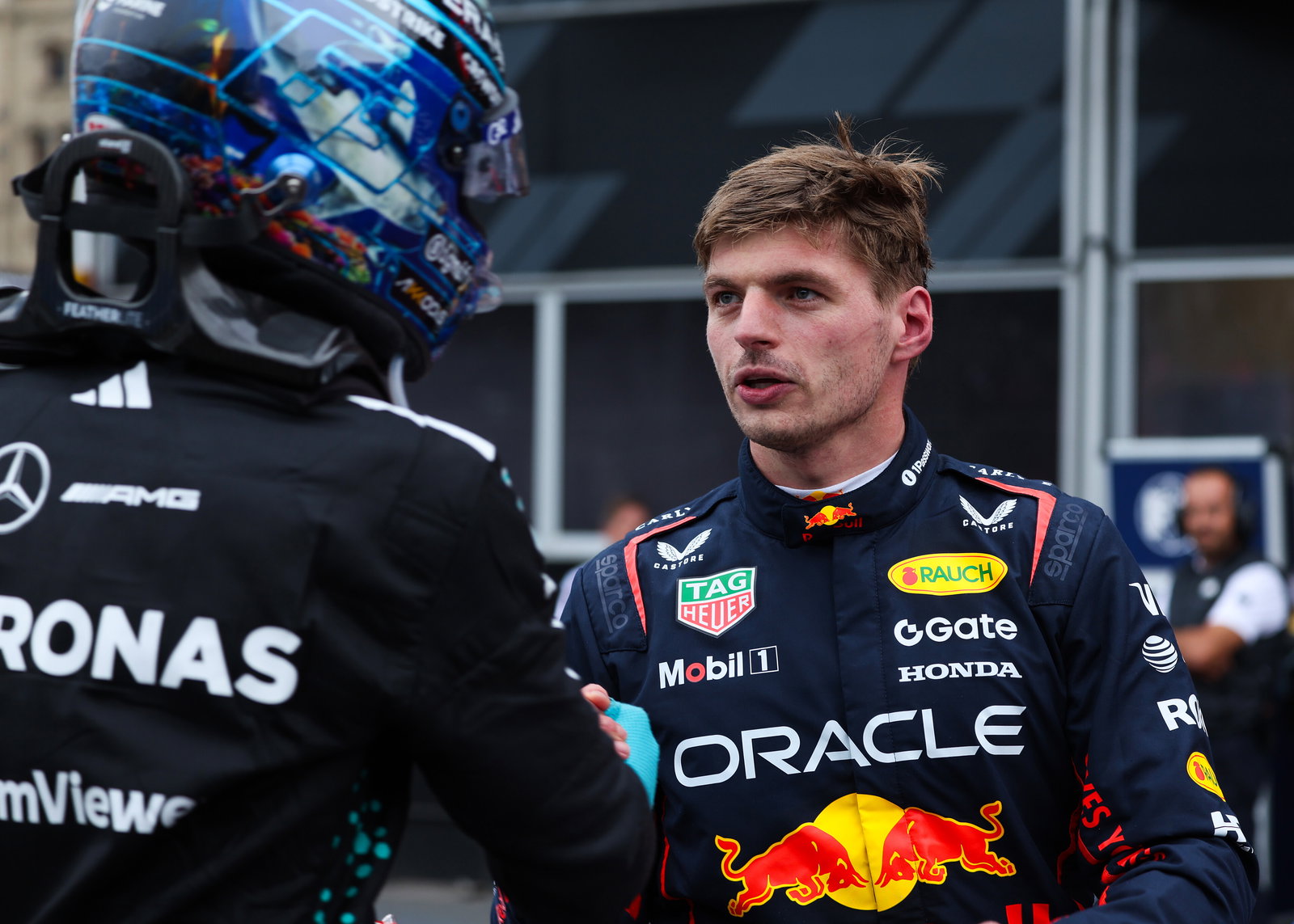 Verstappen is congratulated by Russell