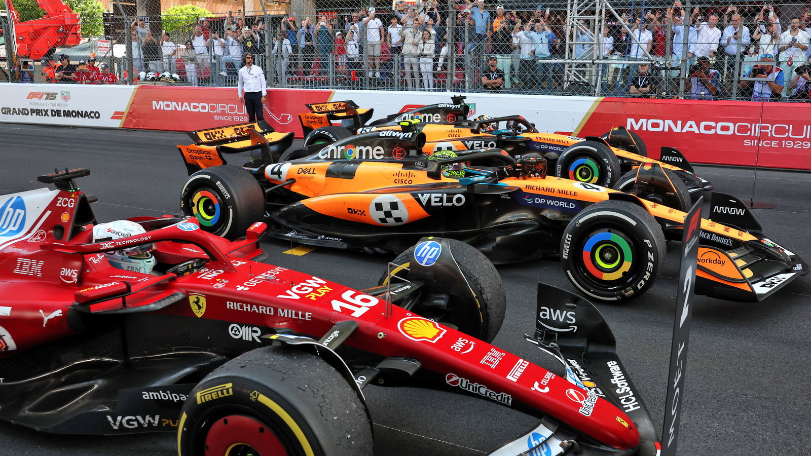 Charles Leclerc and the two McLarens 
