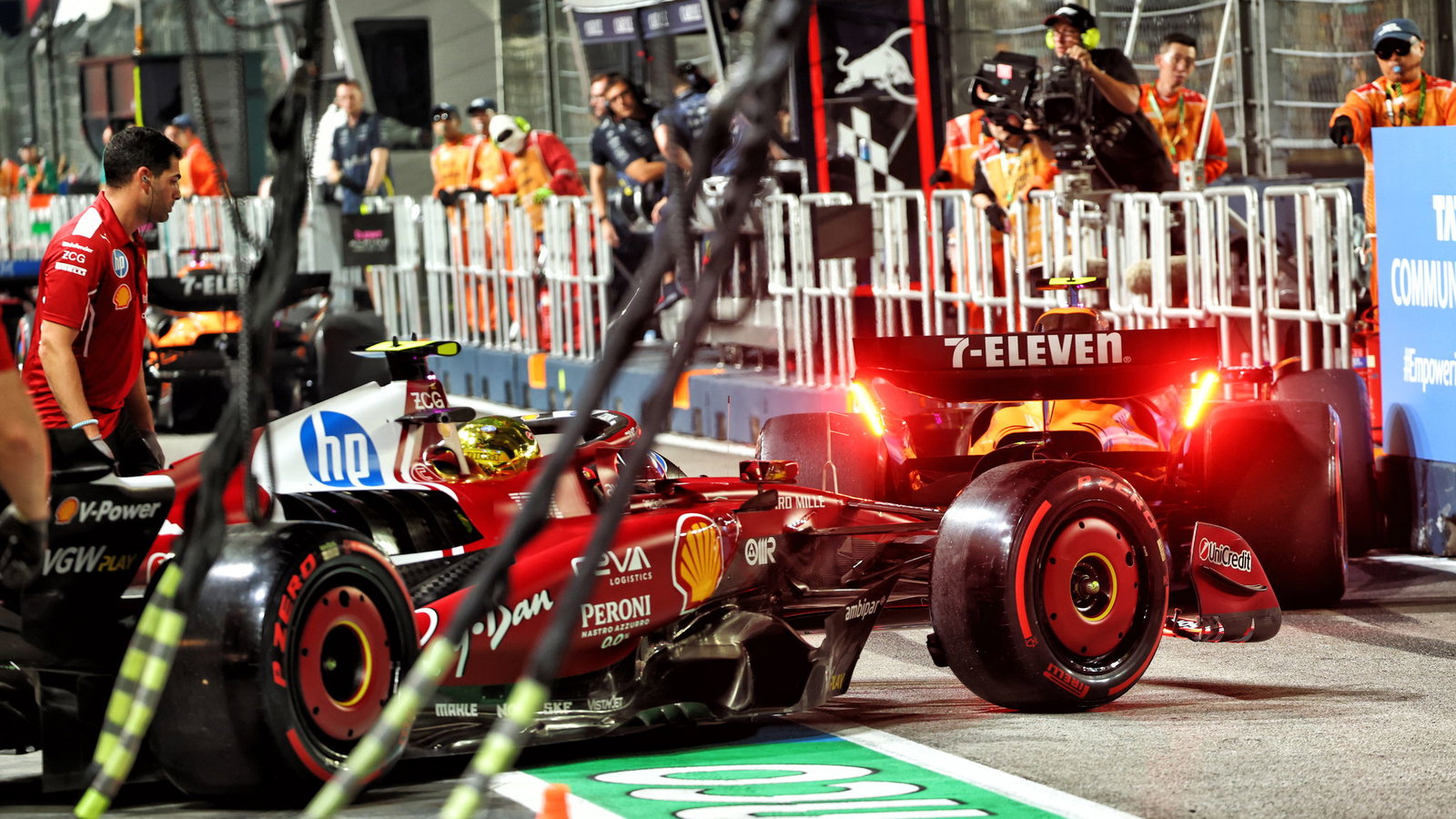 Norris was pushed into the pit wall 