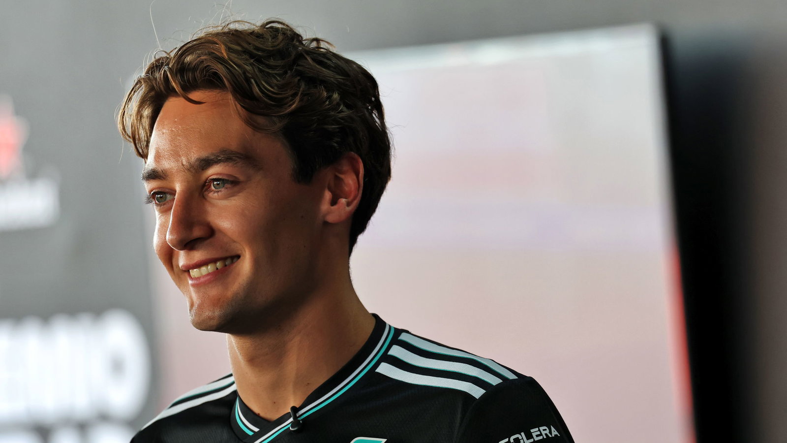 Russell watched the action from the grandstands 