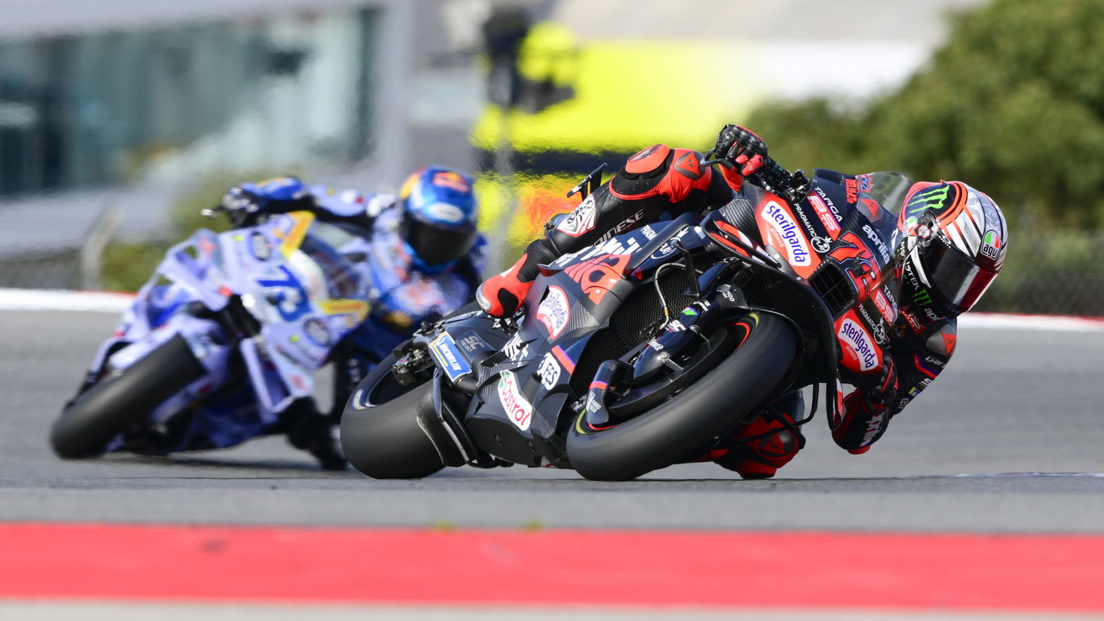 Marco Bezzecchi leads Alex Marquez, 2025 MotoGP Portuguese Grand Prix. Credit: Gold and Goose.