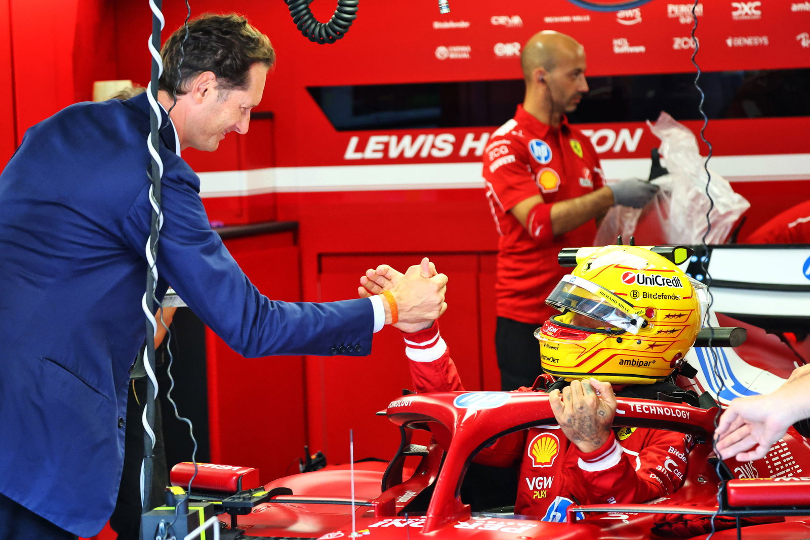 John Elkann and Lewis Hamilton 