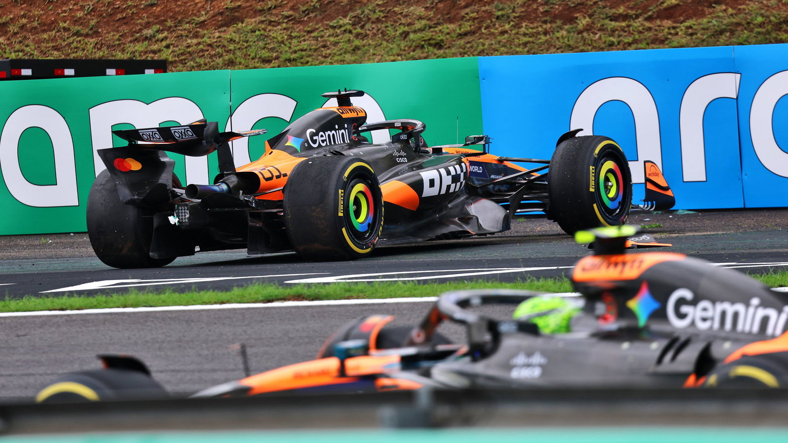 Norris passes his crashed teammate Piastri 