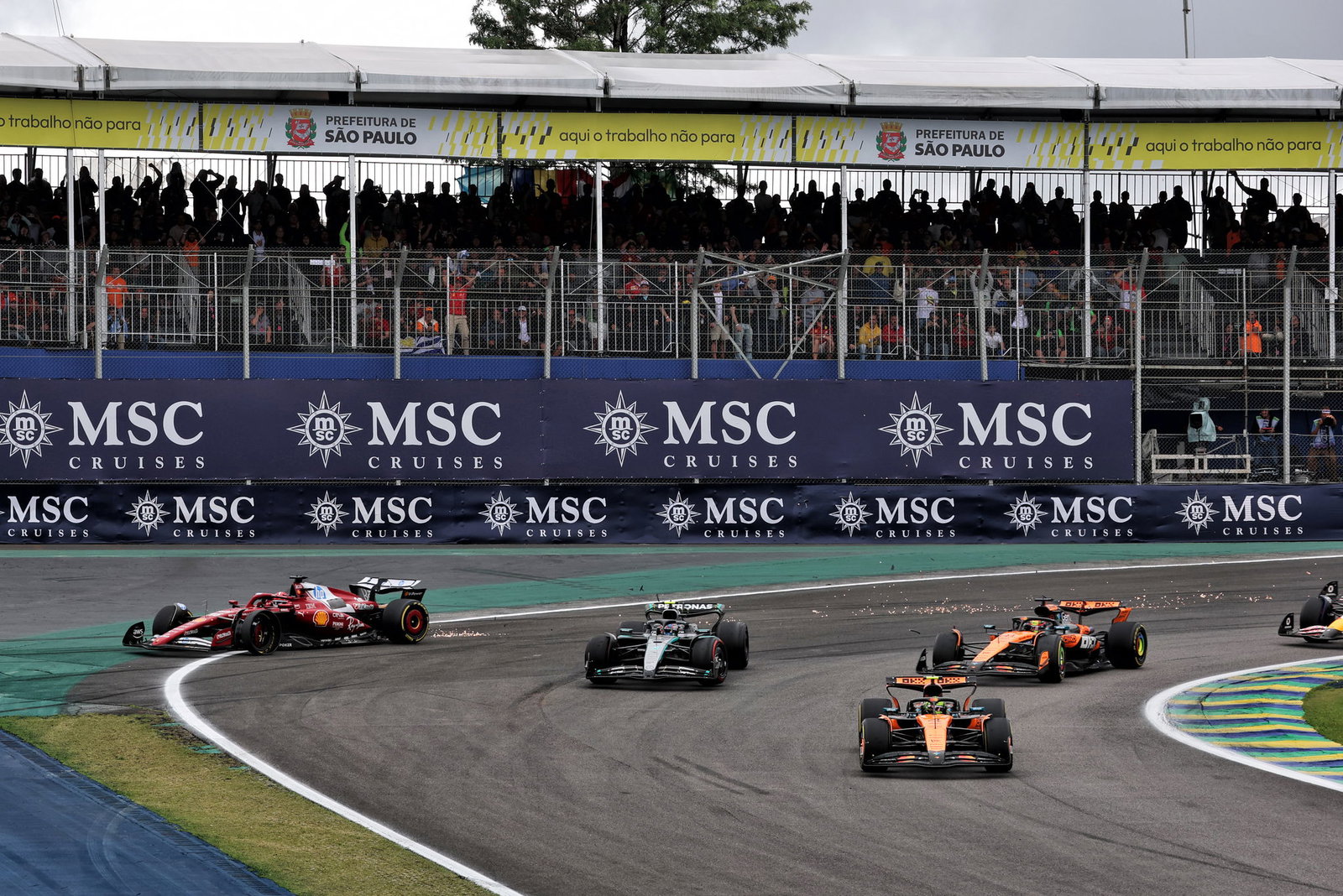 Leclerc was wiped out in the three-way clash
