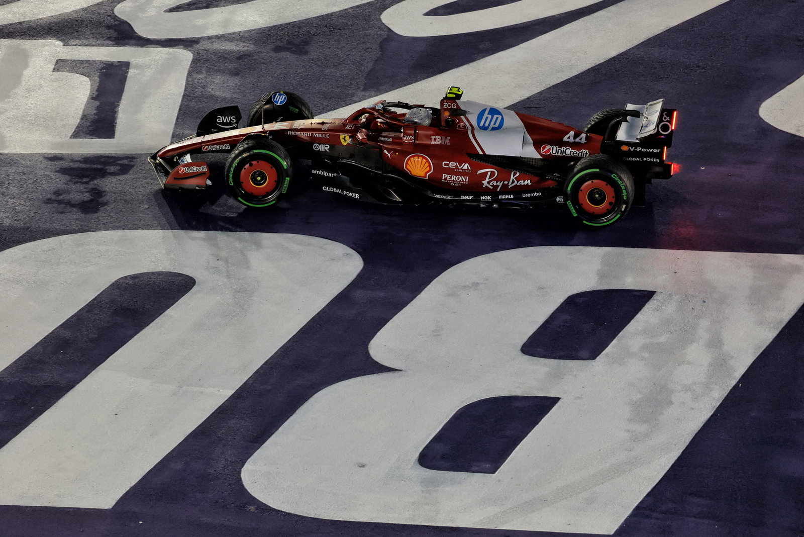 Hamilton runs wide in the tricky conditions 