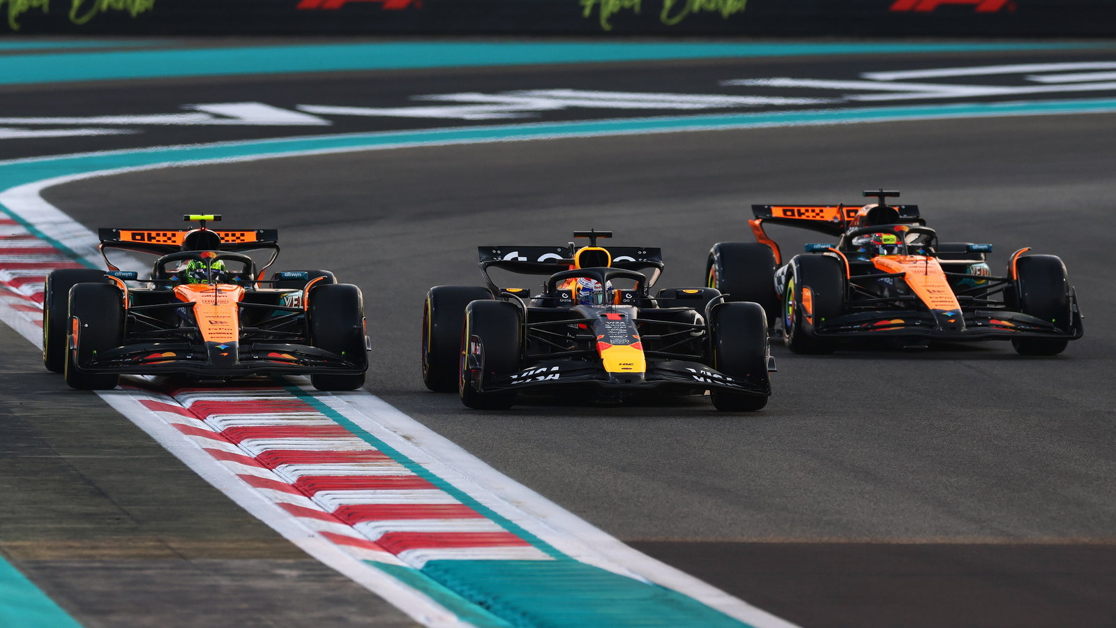 Verstappen fends off the McLarens at the start