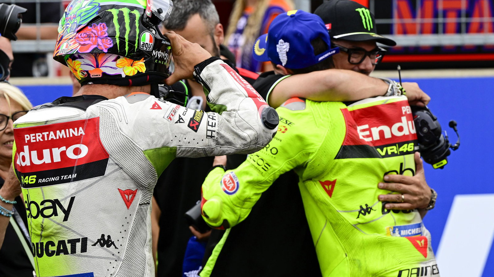 VR46 MotoGP riders Fabio di Giannantonio and Franco Morbidelli celebrate a 2025 Sprint podium.