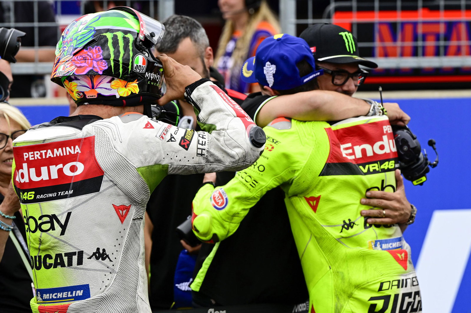 VR46 MotoGP riders Fabio di Giannantonio and Franco Morbidelli celebrate a 2025 Sprint podium.