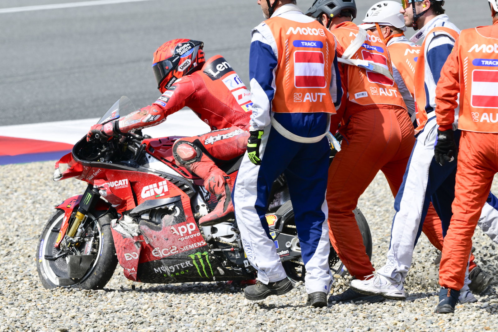 Marc Marquez restarting his bike in the gravel, 2025 MotoGP Austrian Grand Prix. Credit: Gold and Goose.