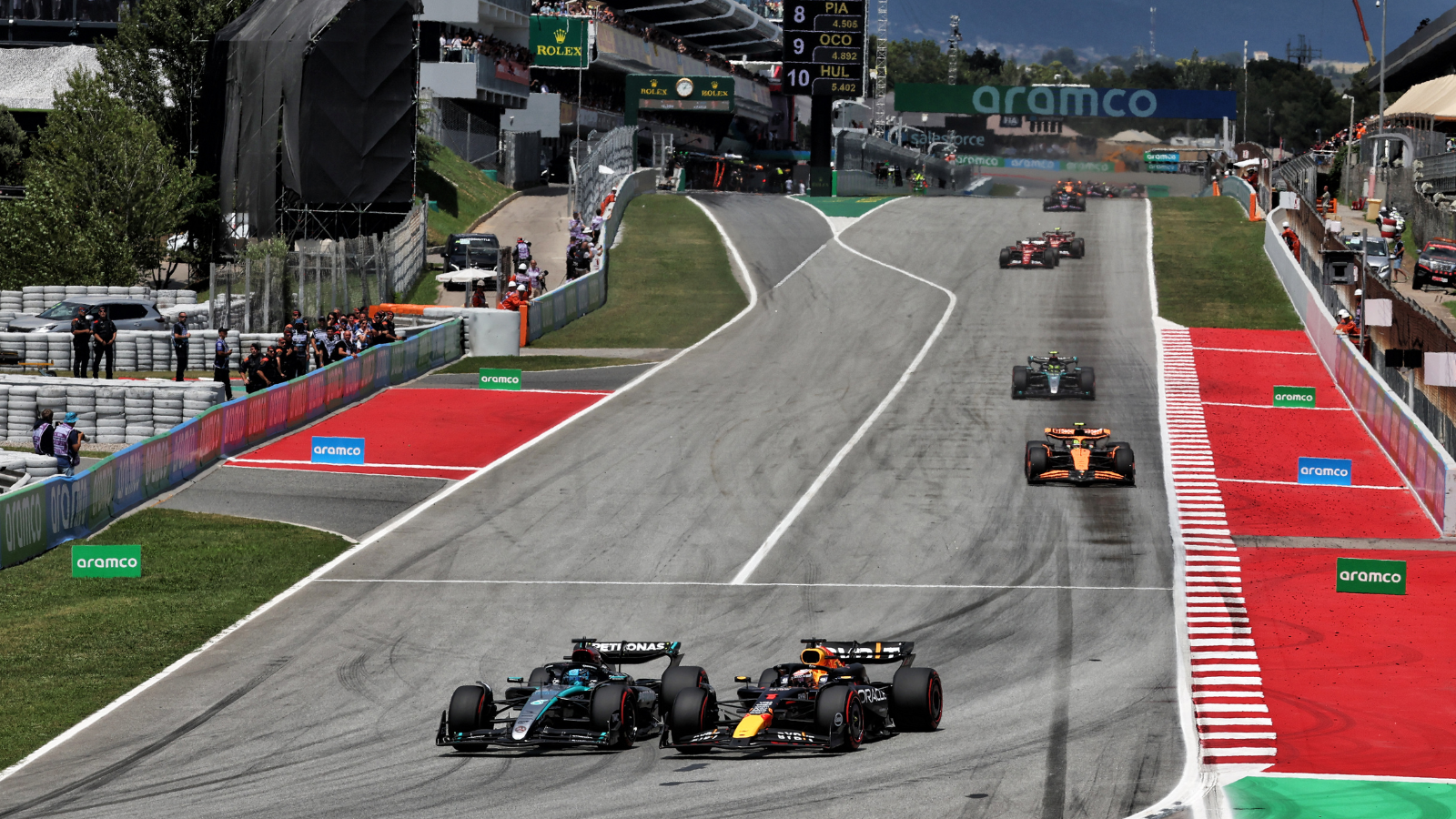 Max Verstappen and George Russell during the 2026 Spanish Grand Prix in Barcelona