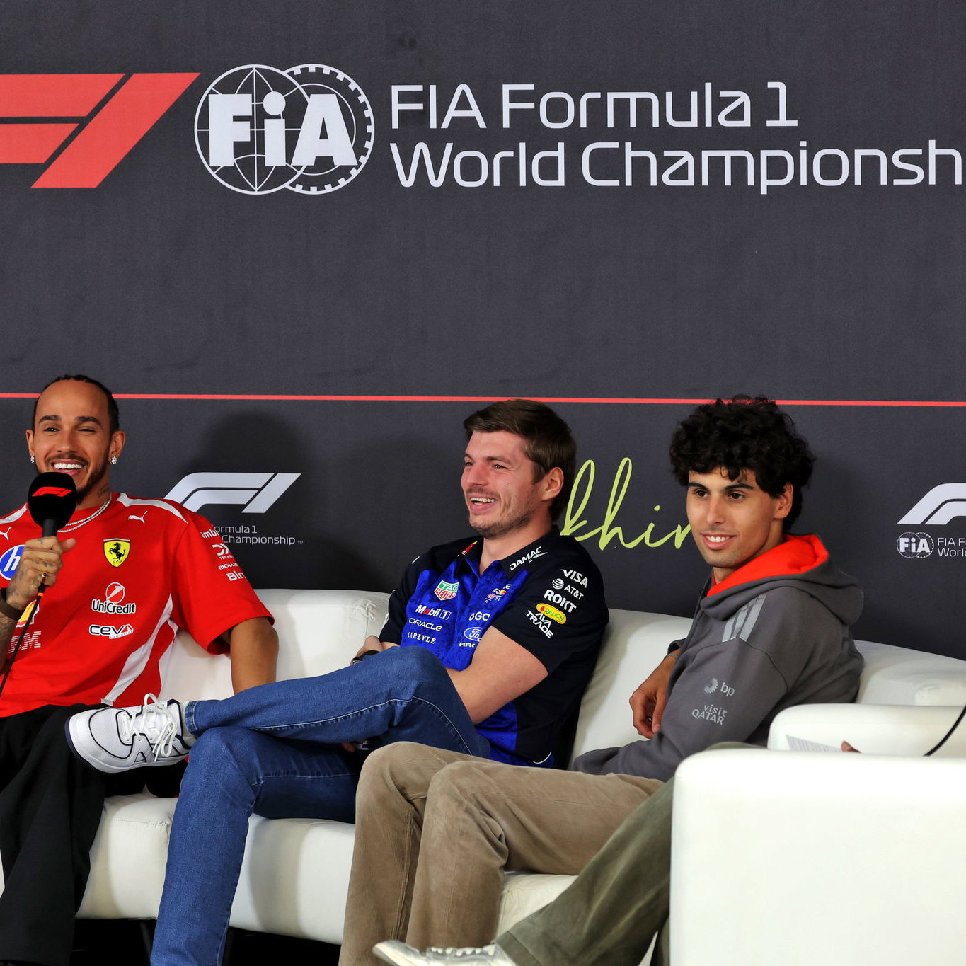 Lewis Hamilton, Max Verstappen and Gabriel Bortoleto during an F1 press conference