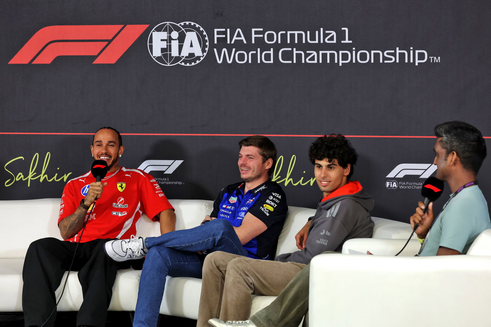 Lewis Hamilton, Max Verstappen and Gabriel Bortoleto during an F1 press conference