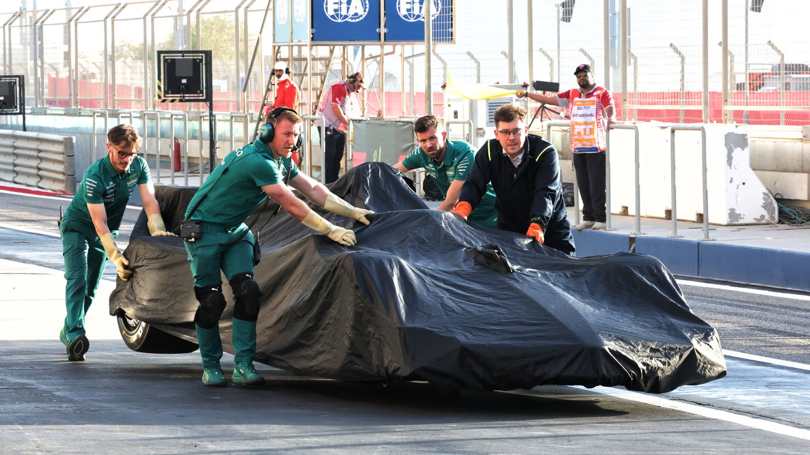 Fernando Alonso's Aston Martin is recovered