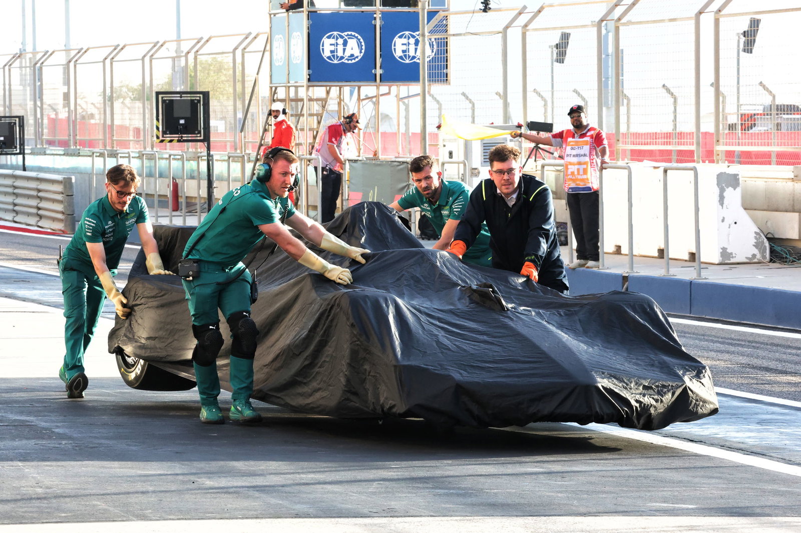 Fernando Alonso's Aston Martin is recovered
