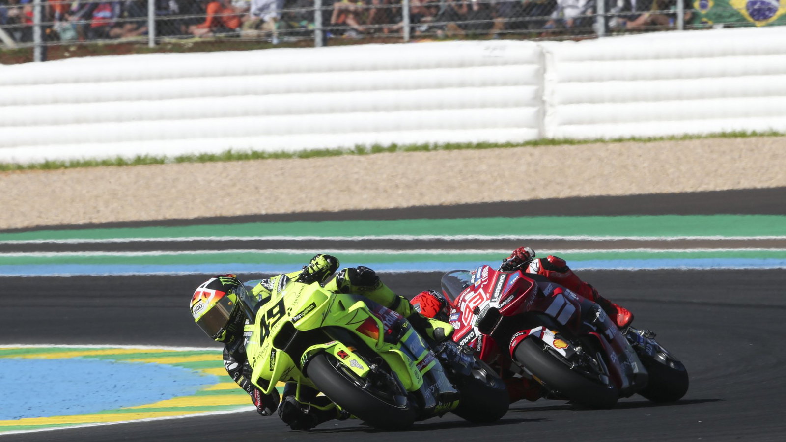 Fabio Di Giannantonio leads Marc Marquez, 2026 MotoGP Brazilian Grand Prix. Credit: Gold and Goose.