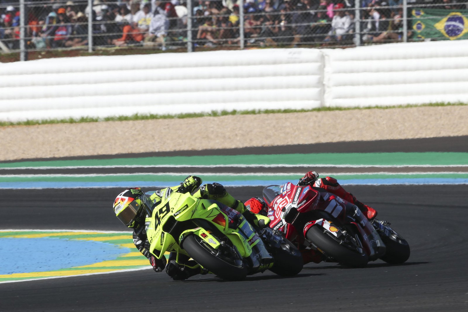 Fabio Di Giannantonio leads Marc Marquez, 2026 MotoGP Brazilian Grand Prix. Credit: Gold and Goose.