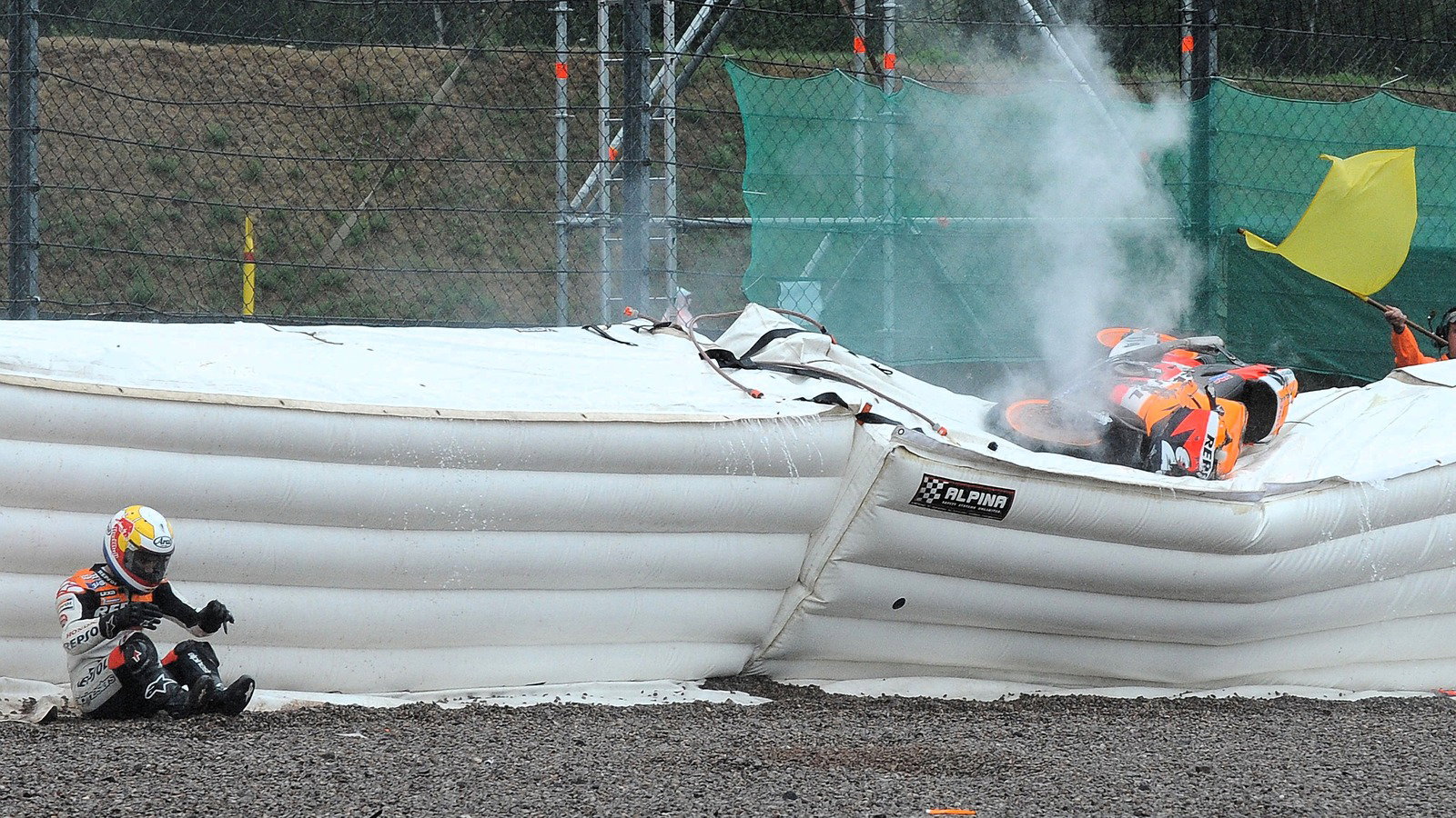 Dani Pedrosa crashes from the lead of a wet 2008 German MotoGP.
