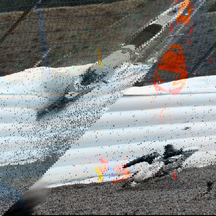 Dani Pedrosa crashes from the lead of a wet 2008 German MotoGP.