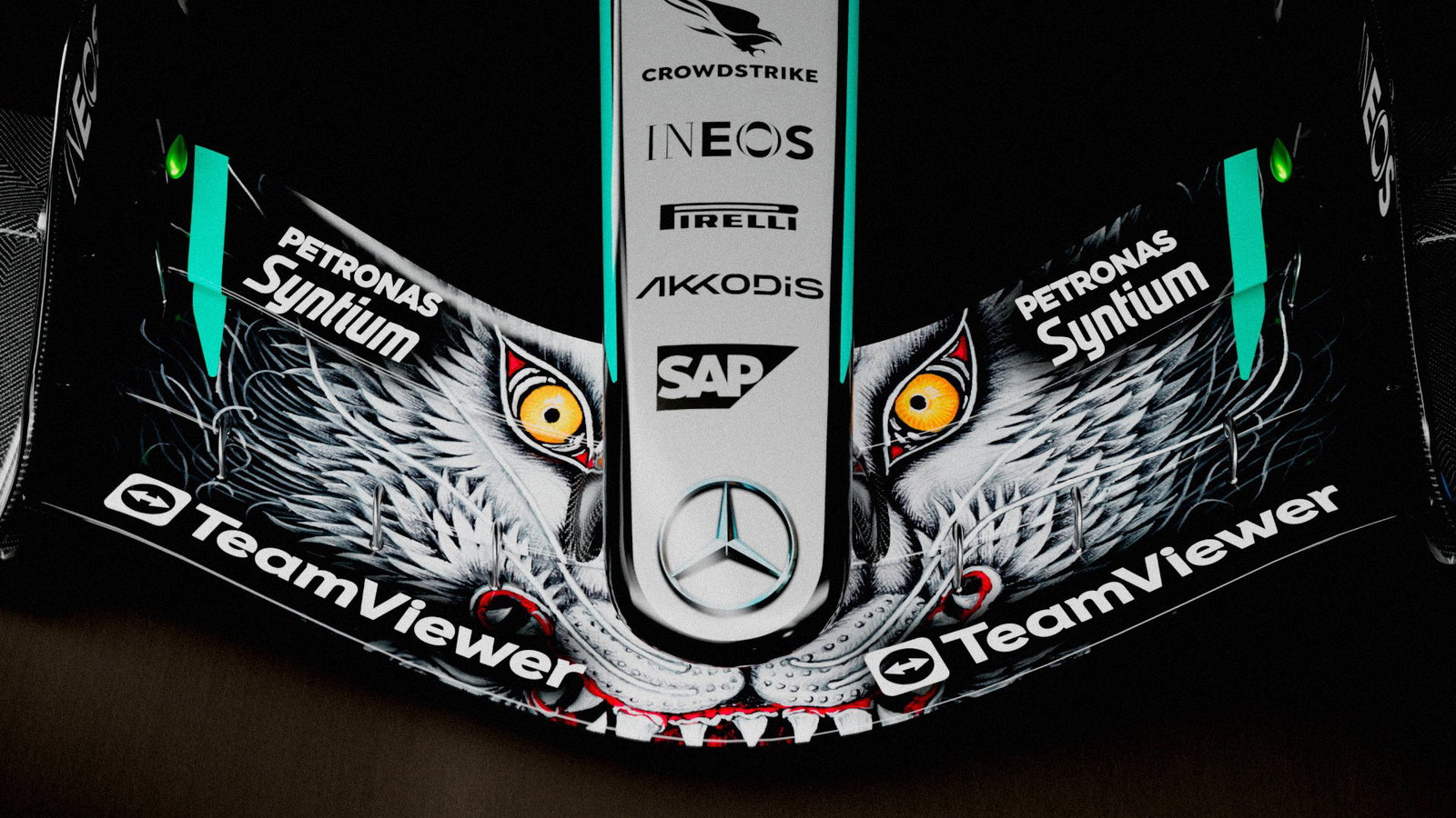 A wolf pattern features on the front wing of the Mercedes