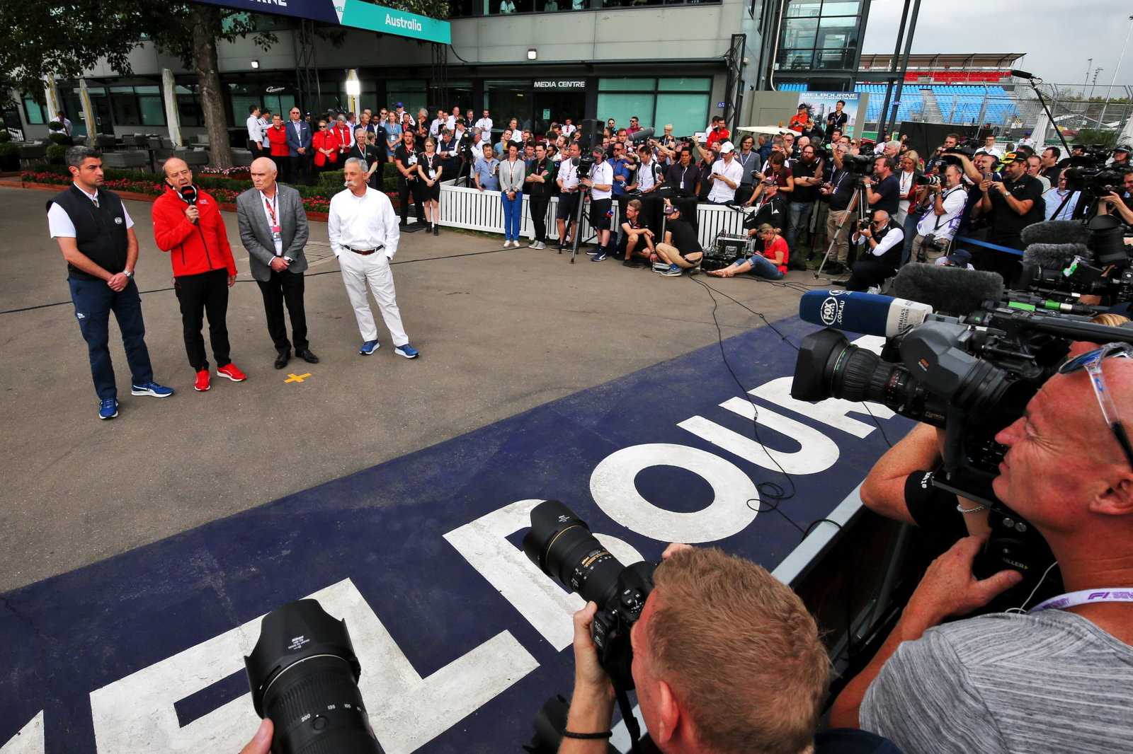 An outdoor press conference is held after the cancellation of the 2020 Australian Grand Prix