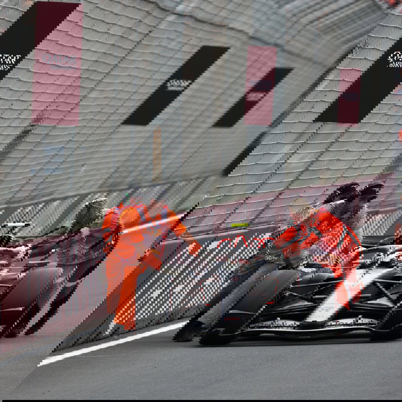 Gabriel Bortoleto is pushed back into the pit lane 