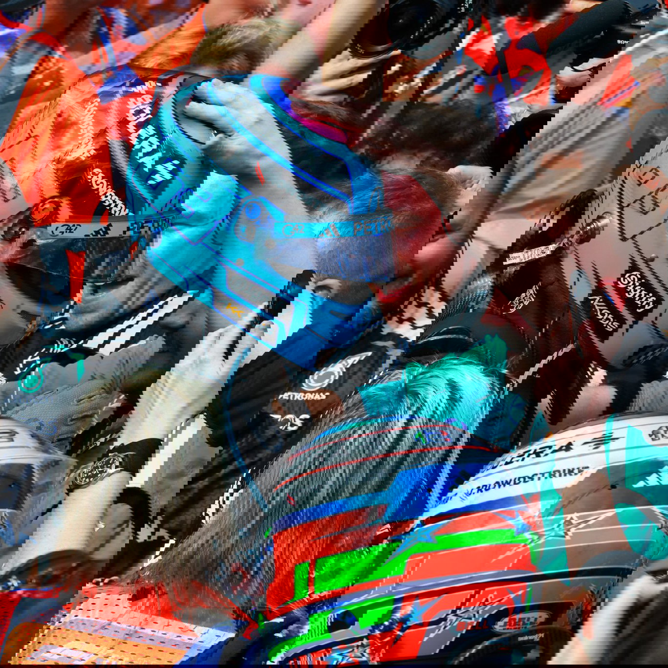 George Russell celebrates his victory 