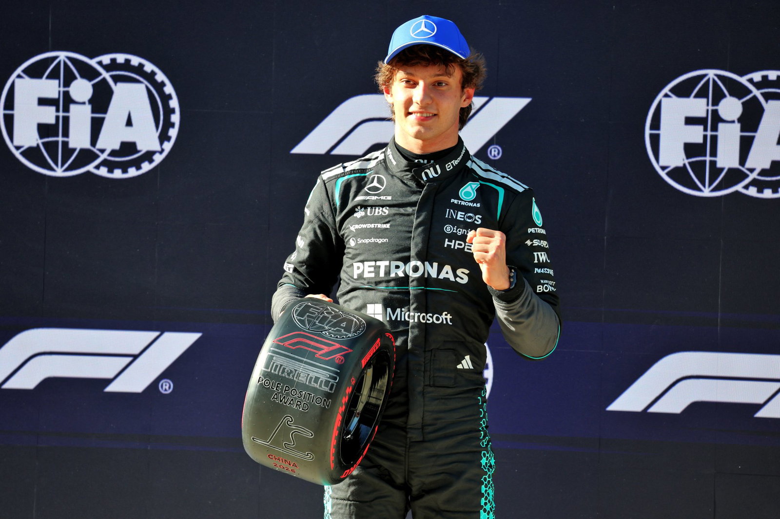 Antonelli celebrates after becoming F1's youngest pole-sitter in China