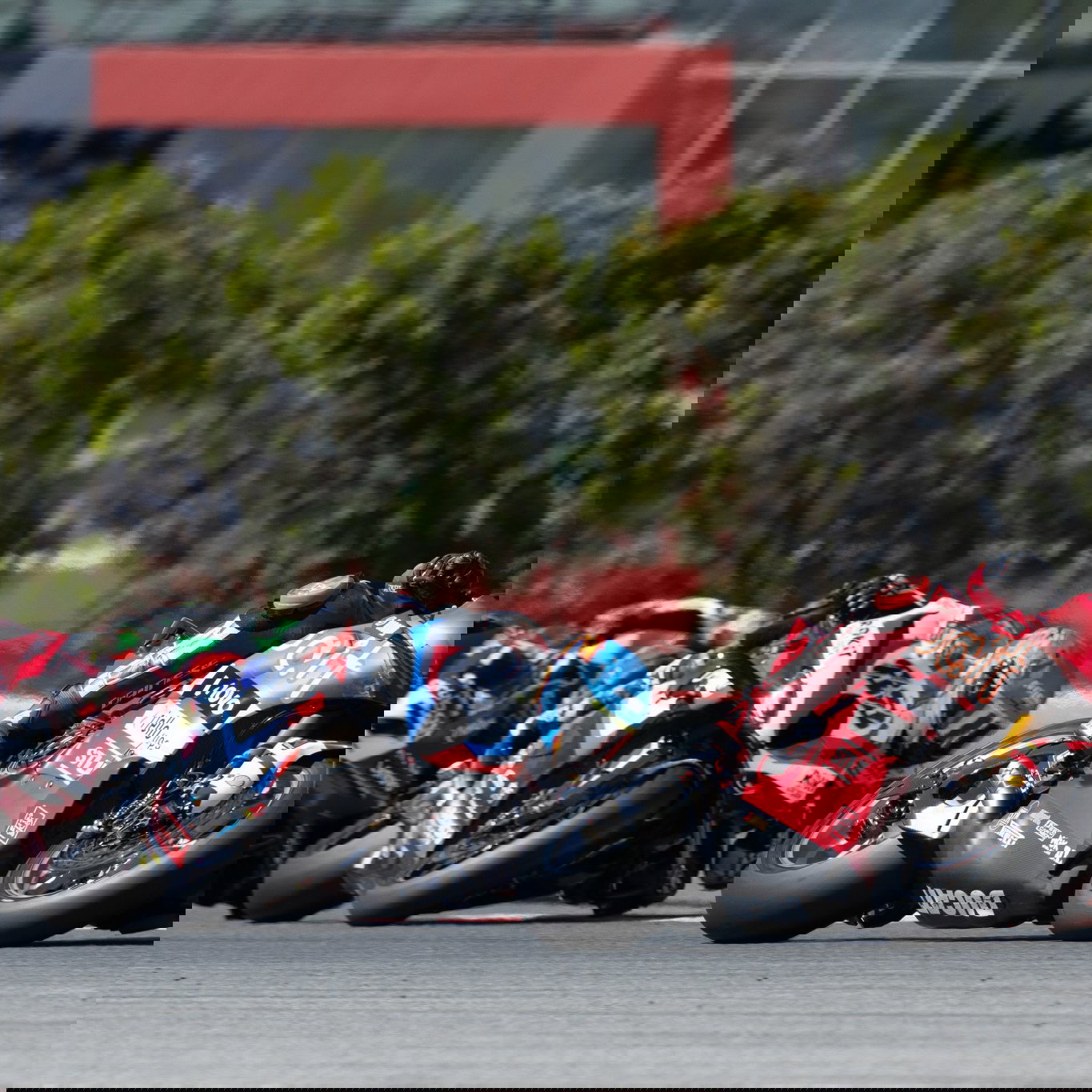 Nicolo Bulega leads Miguel Oliveira, Iker Lecuona, 2026 Portuguese WorldSBK. Credit: Gold and Goose.