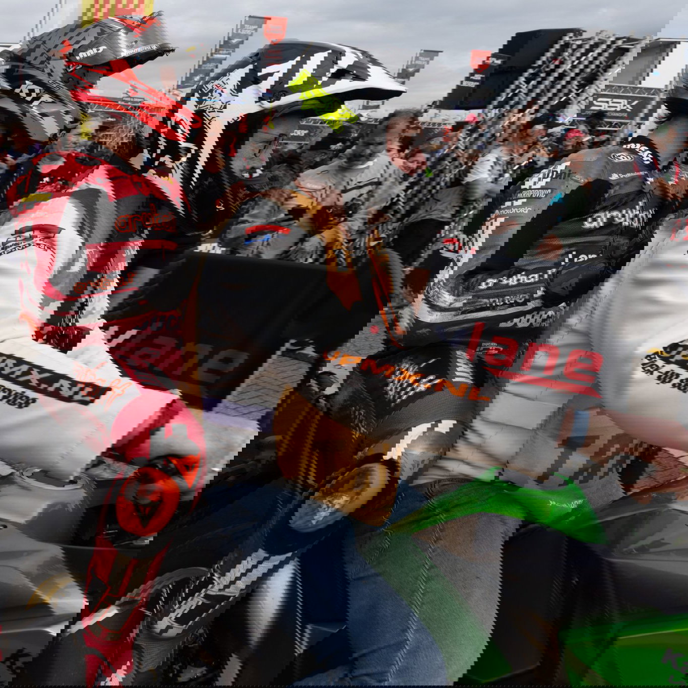 Nicolo Bulega arrives in parc ferme on a scooter after crashing in 2026 Dutch WorldSBK Superpole. Credit: Gold and Goose.