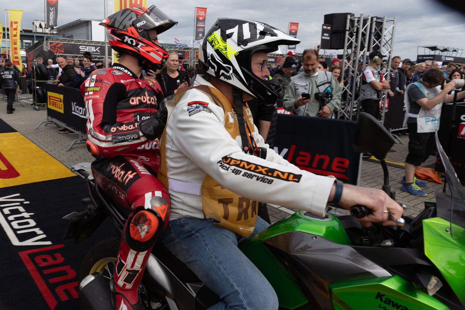Nicolo Bulega arrives in parc ferme on a scooter after crashing in 2026 Dutch WorldSBK Superpole. Credit: Gold and Goose.