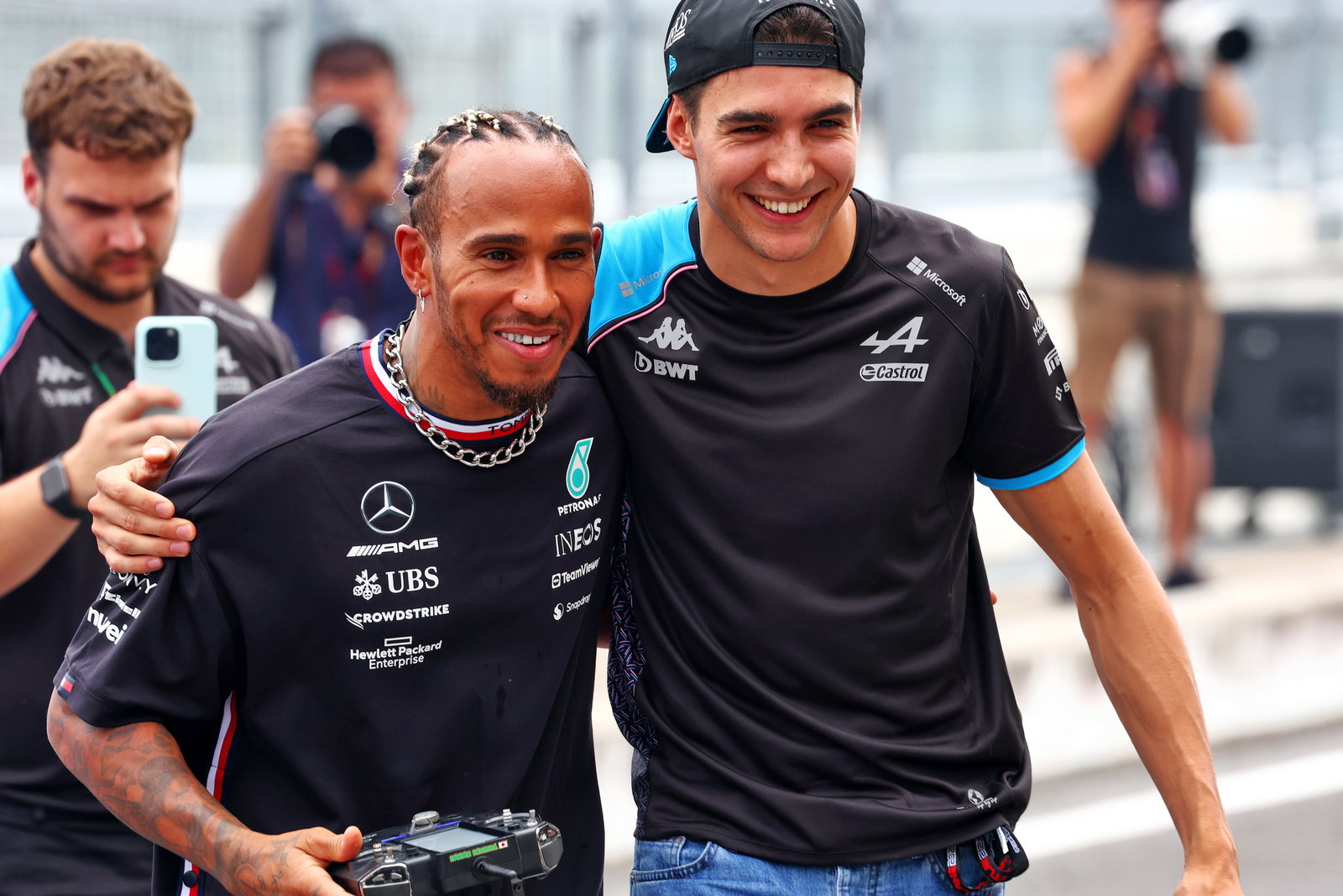 Lewis Hamilton rekindles childhood passion with remote control car race against Esteban Ocon in Suzuka pit lane