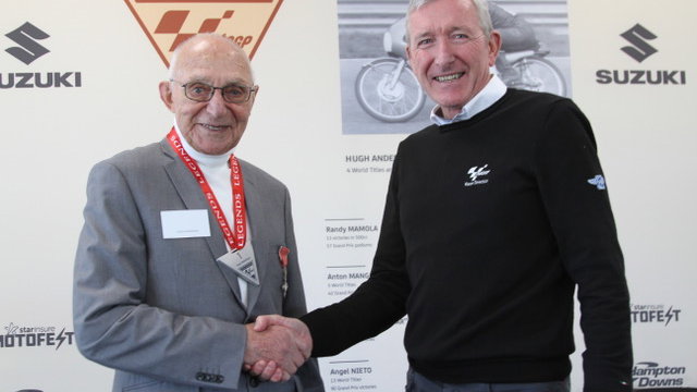MotoGP race director Mike Webb inducts Hugh Anderson as an official MotoGP Legend