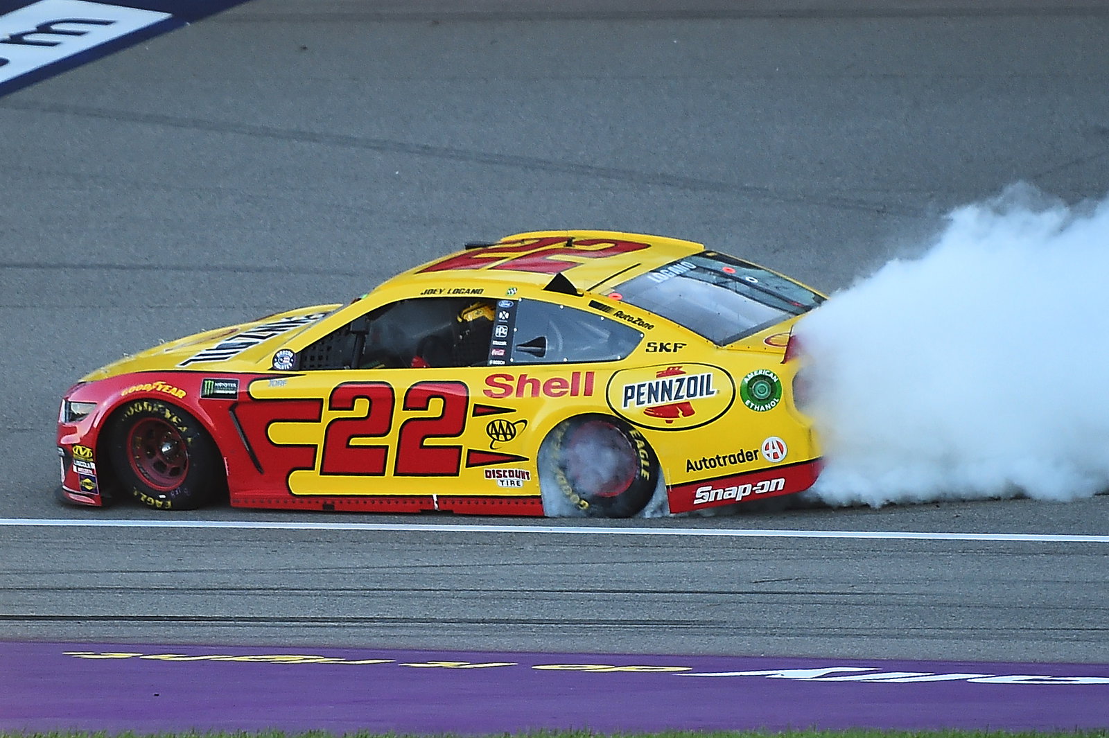 Joey Logano trimphs in overtime finish of Firekeepers Casino 400