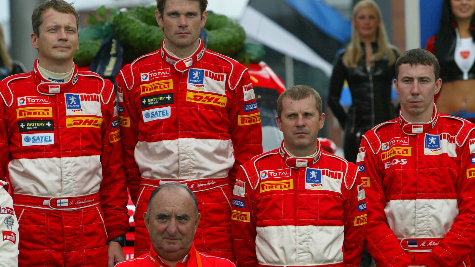Rally Finland winners, Marcus Gronholm and Timo Rautiainen on the podium at the finish, with team bo