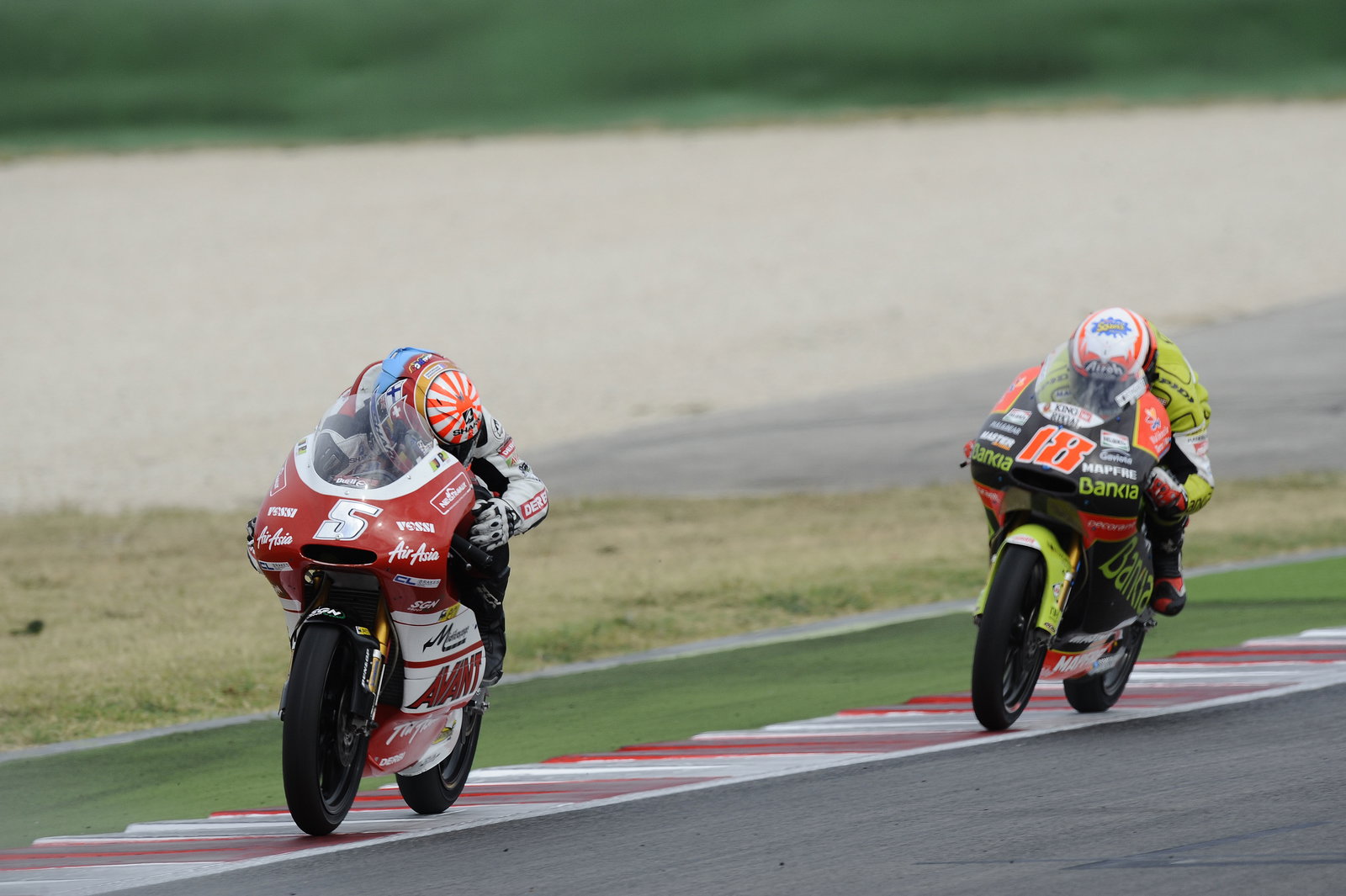Zarco looks back coming out of the last corner on the last lap, San Marino 125GP Race 2011