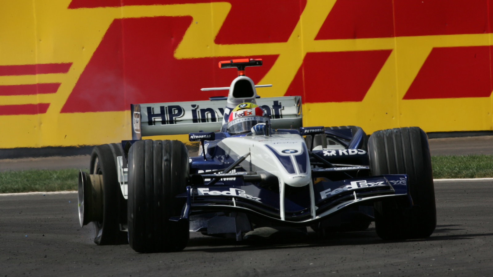 Mark Webber suffers a puncture