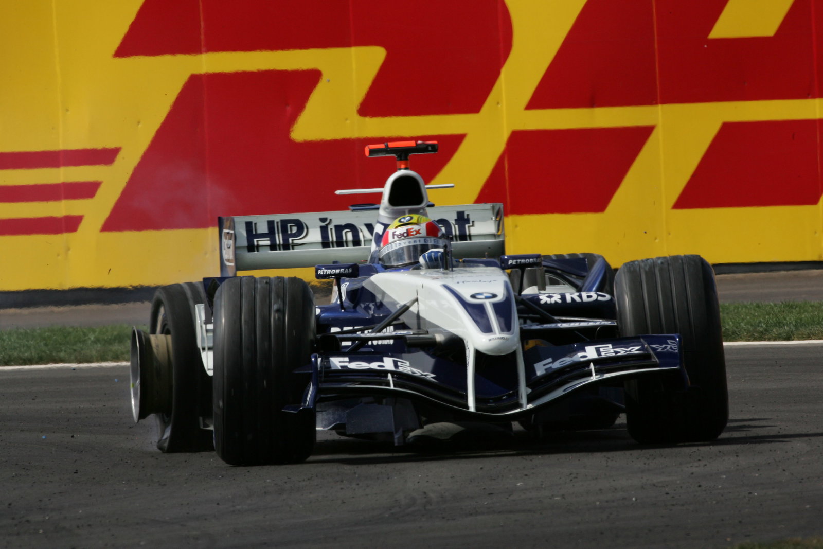 Mark Webber suffers a puncture